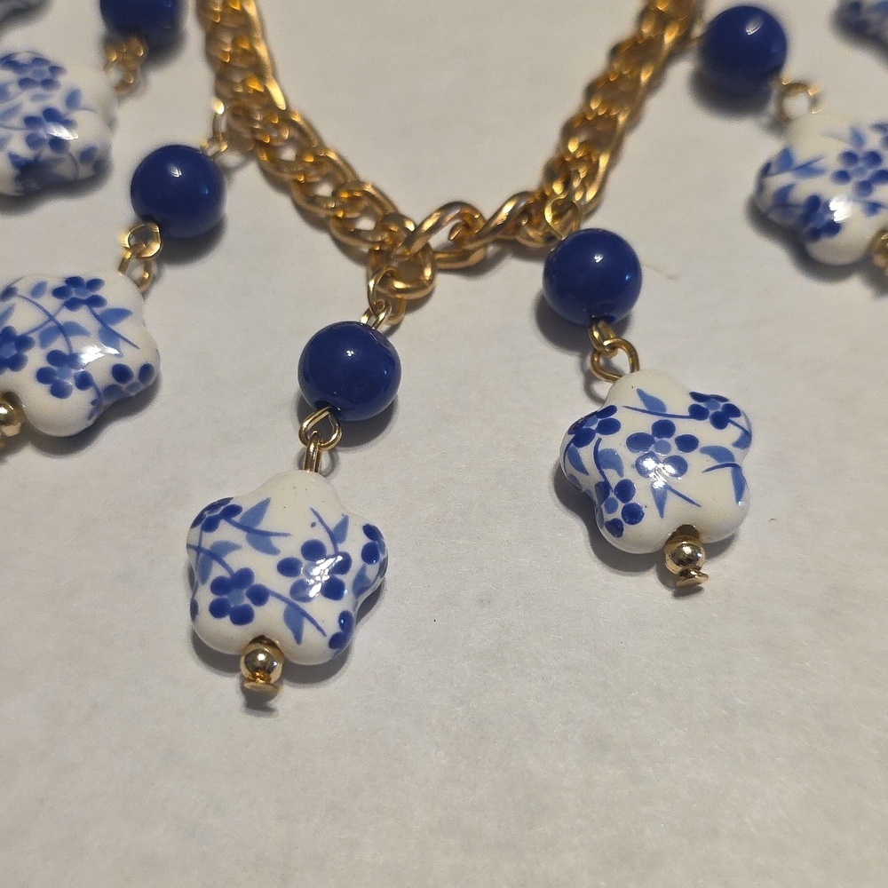Gold and Blue Floral Necklace - Picture 2 of 16